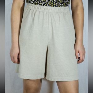 Vintage high waisted tan elastic shorts